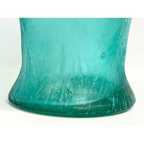 392 - A large early 20th century grass pattern glass vase. 19x32.5cm.