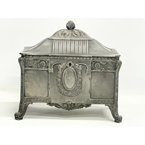 393 - An early 20th century WMF German pewter jewellery box with original key. 22x14x20cm