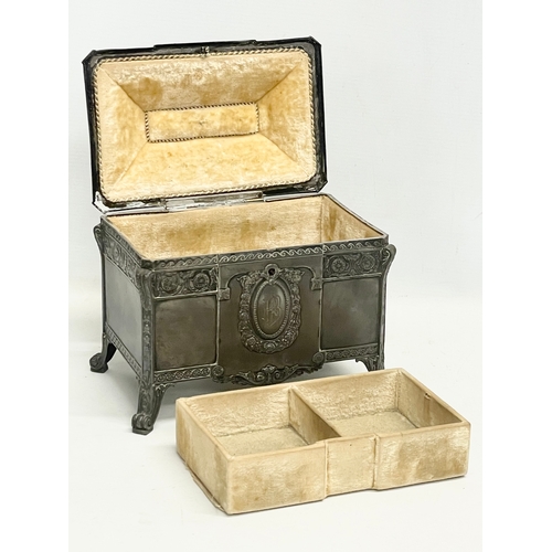 393 - An early 20th century WMF German pewter jewellery box with original key. 22x14x20cm