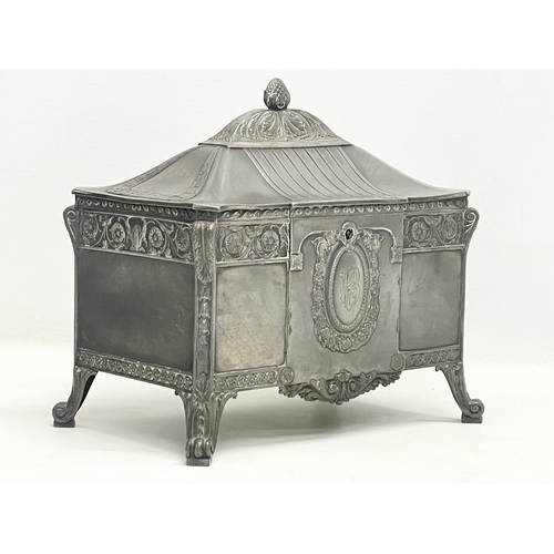 393 - An early 20th century WMF German pewter jewellery box with original key. 22x14x20cm