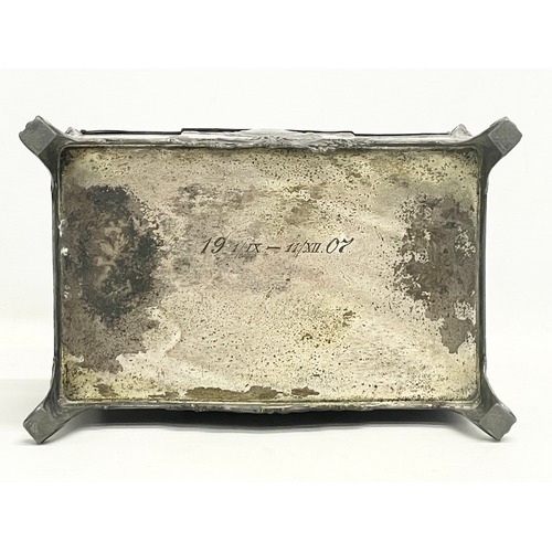 393 - An early 20th century WMF German pewter jewellery box with original key. 22x14x20cm