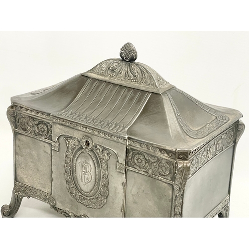 393 - An early 20th century WMF German pewter jewellery box with original key. 22x14x20cm