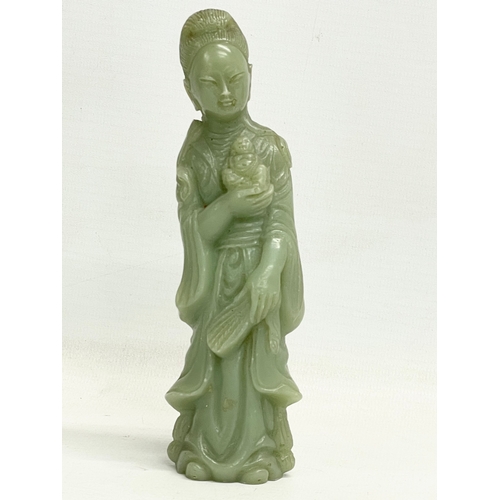 397 - A Chinese jade figure. Early to mid 20th century. 15cm