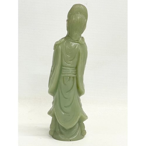 397 - A Chinese jade figure. Early to mid 20th century. 15cm