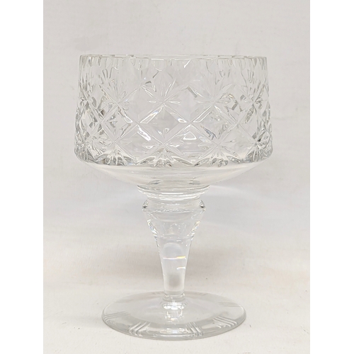 547 - A set of 6 ornate crystal drinking glasses. 13cm