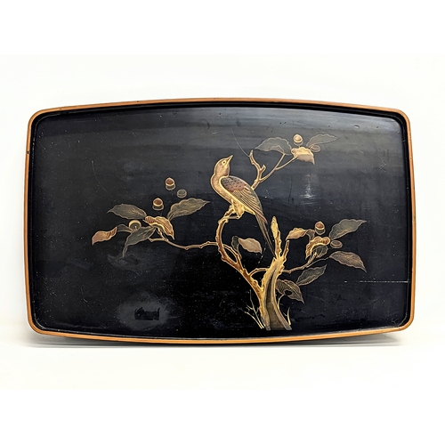 549 - A vintage Japanese lacquered tray. 58x36.5cm