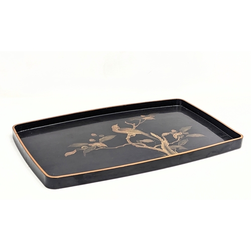 549 - A vintage Japanese lacquered tray. 58x36.5cm