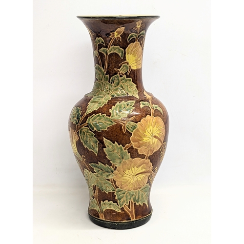 560 - A large vintage glazed Chinese vase. 55cm