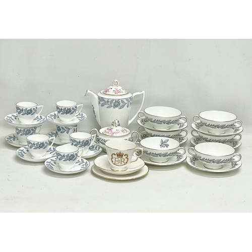 564 - A collection of Mintons coffee and dinner ware.