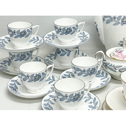 564 - A collection of Mintons coffee and dinner ware.