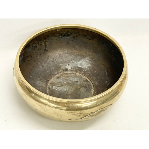 65B - A large late 19th century Japanese heavy brass bowl. 35x15cm