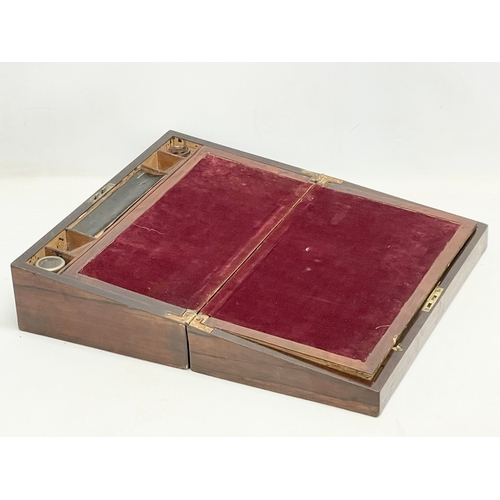 65C - A Victorian rosewood writing slope. Closed 43.5x25x14.5cm