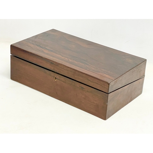 65C - A Victorian rosewood writing slope. Closed 43.5x25x14.5cm