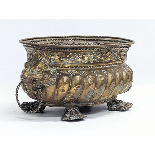 65E - An ornate 19th century planter with lion paw feet in the Regency style. 31x15.5cm