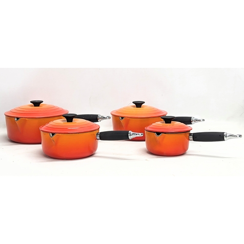 570 - A set of 4 cast iron Le Creuset pots. Largest measures 22x14cm without handle. Smallest measures 18x... 