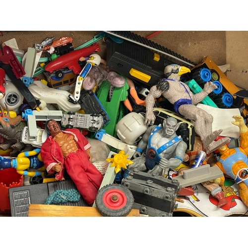 599 - A collection of vintage toys. Including He Man. Thundercats etc.