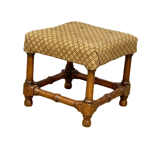 1153 - A Victorian oak footstool. 37x37x34cm