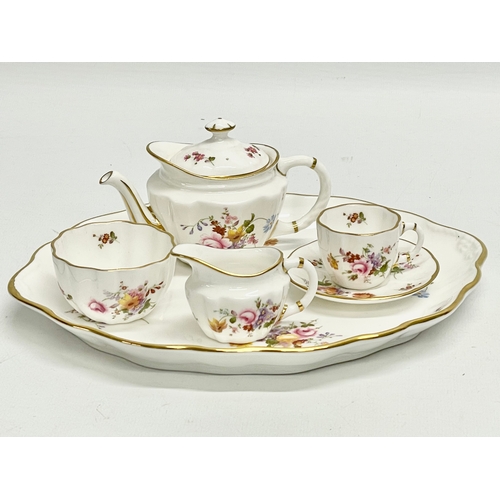 7 - A Royal Crown Derby ‘Derby Posies’ miniature porcelain tea set in box. Tray measures 22x17cm.