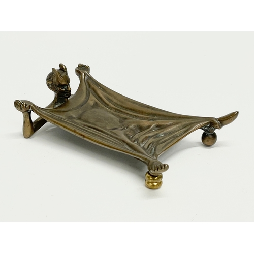 10 - A bronze ‘Devil Under A Sheet’ card tray. By Humphries, Jackson & Ambler LTD. Early 20th century. Ma... 