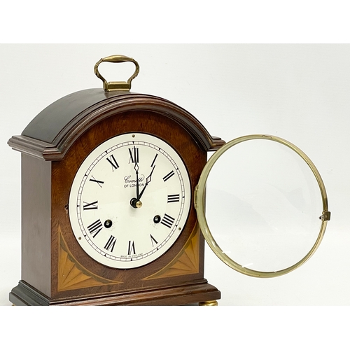 19 - A Comitti of London inlaid mahogany mantle clock. With key. 18x8.5x24cm