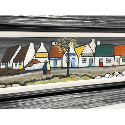 36 - A large oil painting on board by Mary Lou. An Irish Village. New frame. 120.5x18.5cm. Frame 142.5x40... 