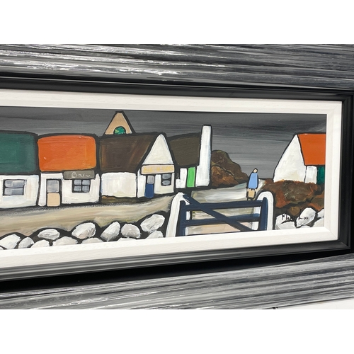 36 - A large oil painting on board by Mary Lou. An Irish Village. New frame. 120.5x18.5cm. Frame 142.5x40... 