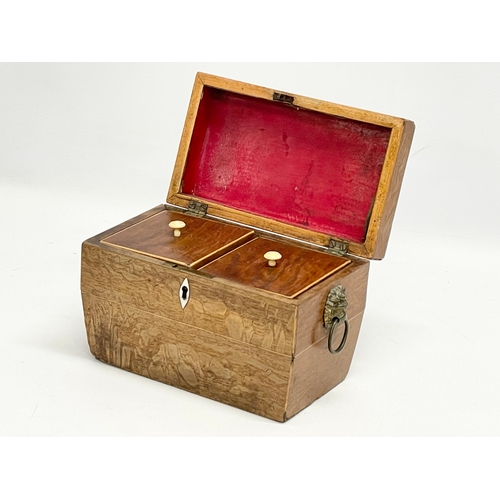 46 - A Regency oak tea caddy. Circa 1810.  21x11x14cm