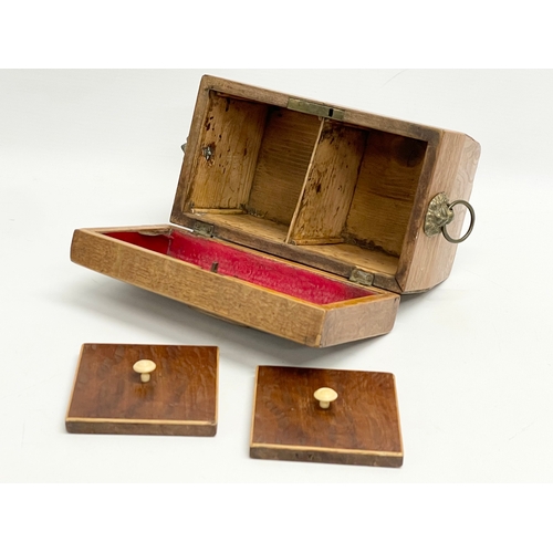 46 - A Regency oak tea caddy. Circa 1810.  21x11x14cm