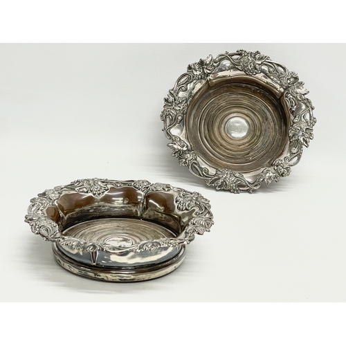 222 - A pair of large Victorian silver plated wine coasters. 19cm