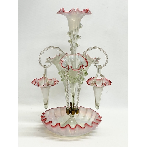 20 - A large Victorian Vaseline and Cranberry Glass epergne. 51cm