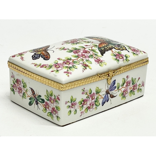 50 - An Atelier Le Tallec, Paris hand painted porcelain trinket box. Limoges France. 14x9x16cm