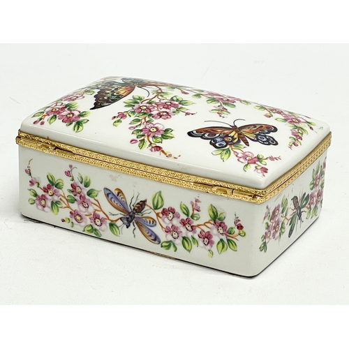 50 - An Atelier Le Tallec, Paris hand painted porcelain trinket box. Limoges France. 14x9x16cm