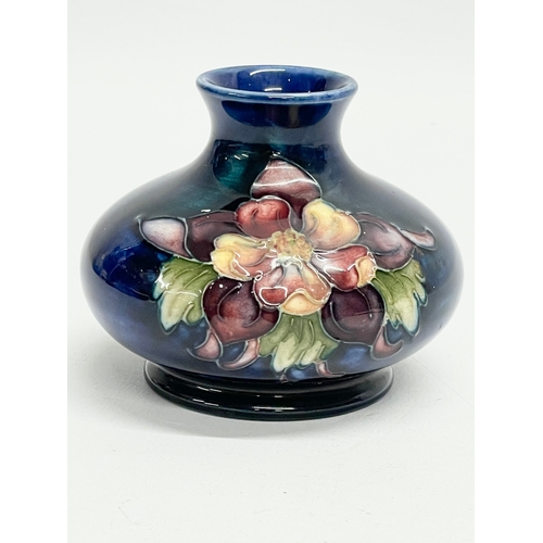 72 - A vintage Moorcroft ‘Anemone’ vase. 9x7cm