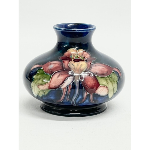 72 - A vintage Moorcroft ‘Anemone’ vase. 9x7cm