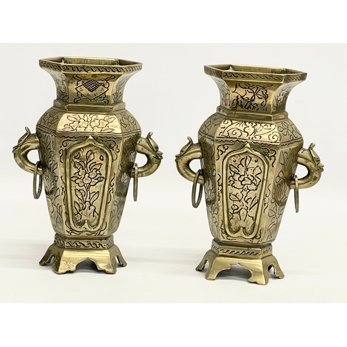 74 - A pair of late 19th century Chinese brass vases. 15x21cm