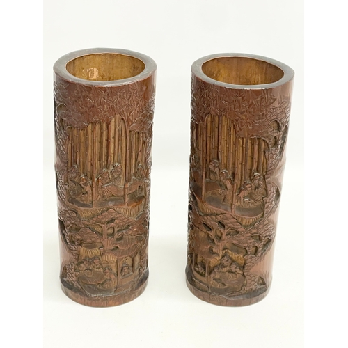 77 - A pair of large 19th century Chinese brush pots. 30cm