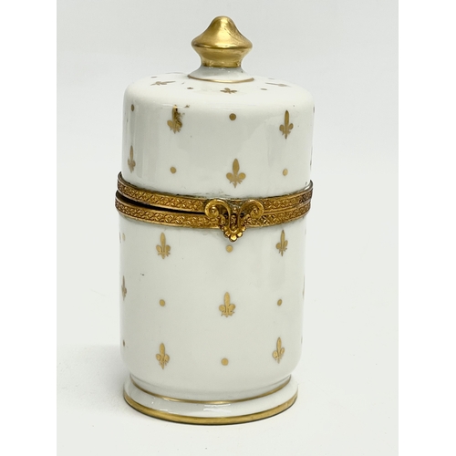 78 - 3 pieces of Limoges Peint Main (hand painted) porcelain. A cylinder trinket box 13cm, and a pair of ... 