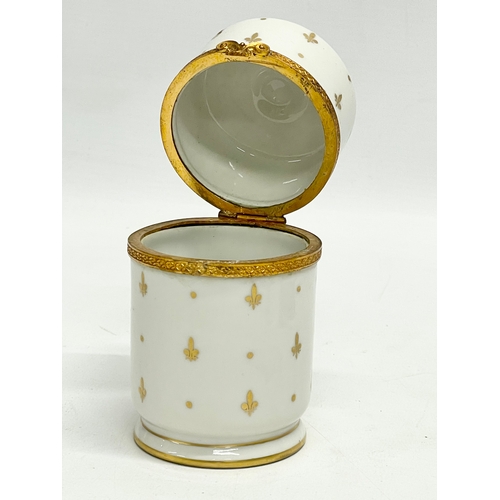 78 - 3 pieces of Limoges Peint Main (hand painted) porcelain. A cylinder trinket box 13cm, and a pair of ... 