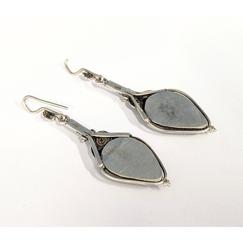 350 - A pair of ornate silver earrings