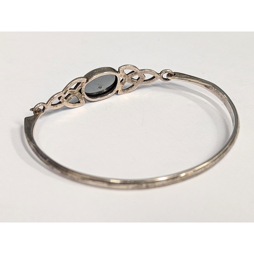 360 - A silver bracelet / bangle.