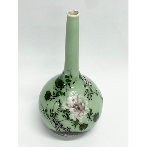 90 - A 19th century Chinese Celadon bud vase. 15.5cm