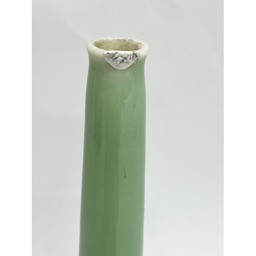 90 - A 19th century Chinese Celadon bud vase. 15.5cm