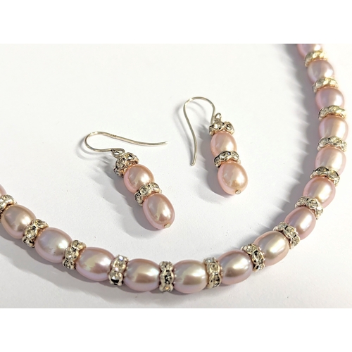 370 - A silver necklace and earring set