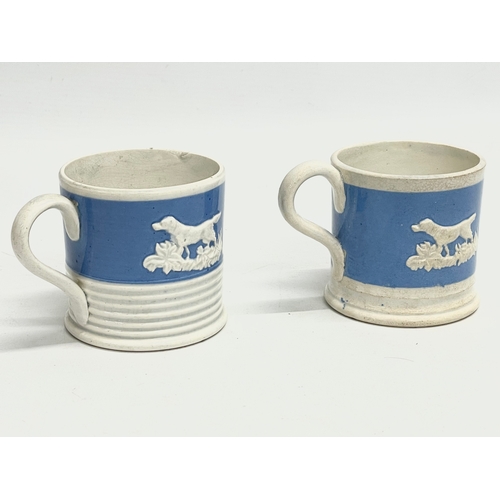 103 - A pair of early to mid 19th century mugs. 10x7cm