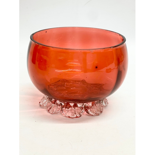 105 - 3 pieces of late 19th century Cranberry and Ruby Glass. Jug measures 14x15cm