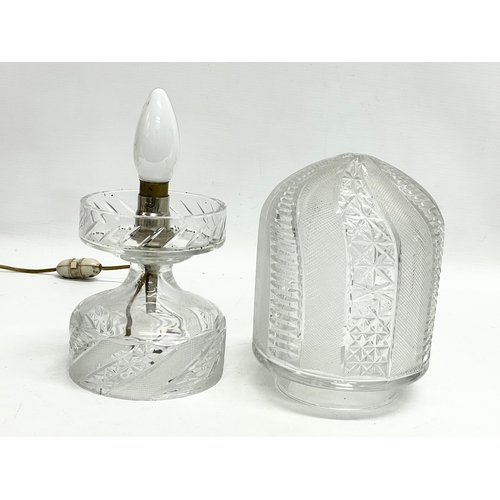 106 - A 1930’s cut glass table lamp. 31cm