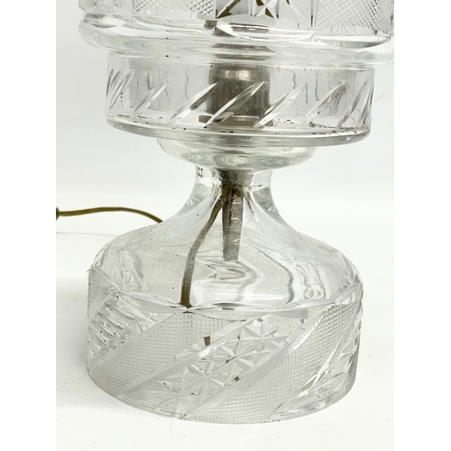 106 - A 1930’s cut glass table lamp. 31cm