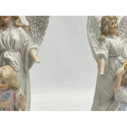 298 - 4 figurines. A pair of late 19th/early 20th century bisque Angel figures. 2 Maruri porcelain figurin... 