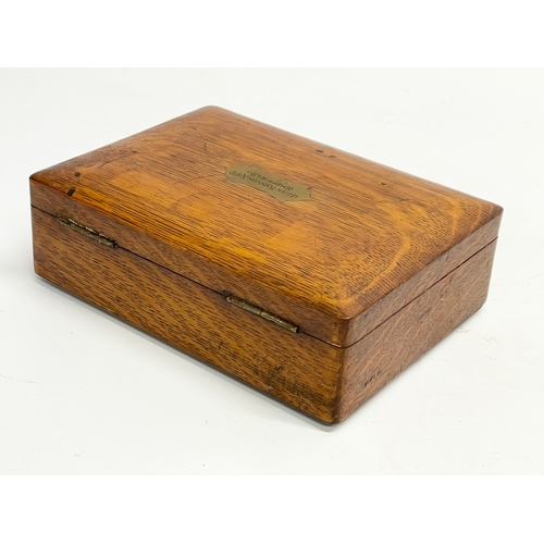 190 - A Victorian oak box. From John Kenyon & Co, Sheffield. 19.5x14.5x6cm