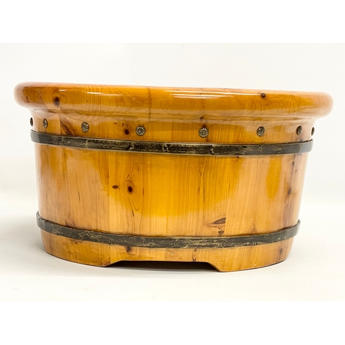 192 - A Chinese Yew Wood foot bath. By Muzhiyun. 40x21cm